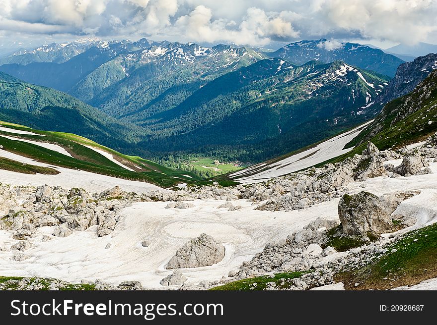 Snow and stones in the North Caucasus mountains. Russia. Snow and stones in the North Caucasus mountains. Russia.