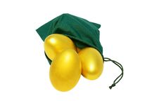 Golden Eggs In A Bag Stock Photography