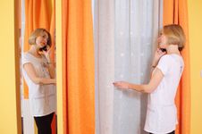 Blonde Woman Talking By The Phone Royalty Free Stock Photography