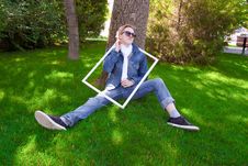 Young Human On The Green Grass Stock Photo Young Human On The Green Grass Stock Photo