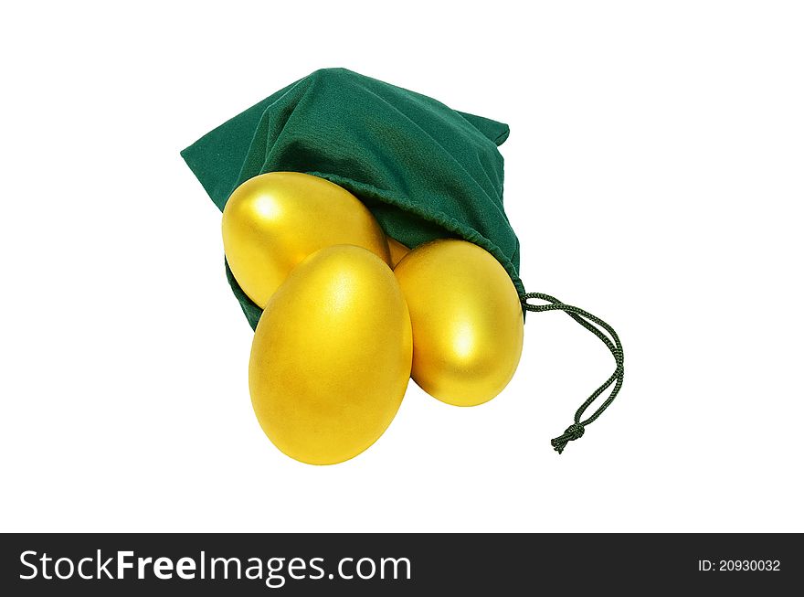 Golden eggs in a green bag. Golden eggs in a green bag
