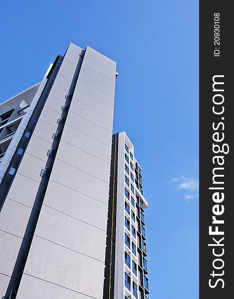 Modern apartment buildings in the blue sky. Modern apartment buildings in the blue sky.