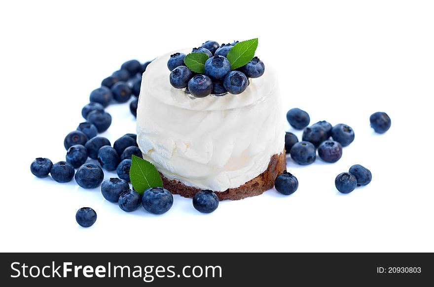 Cheesecake with blueberries on white background. Cheesecake with blueberries on white background