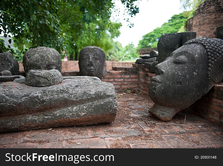 A beautifully carved Buddha statue head in Ayutthaya, Thailand. A beautifully carved Buddha statue head in Ayutthaya, Thailand