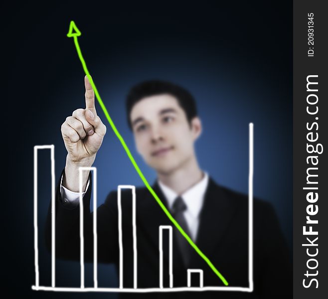 Businessman touching graph, representing business growth. Businessman touching graph, representing business growth.