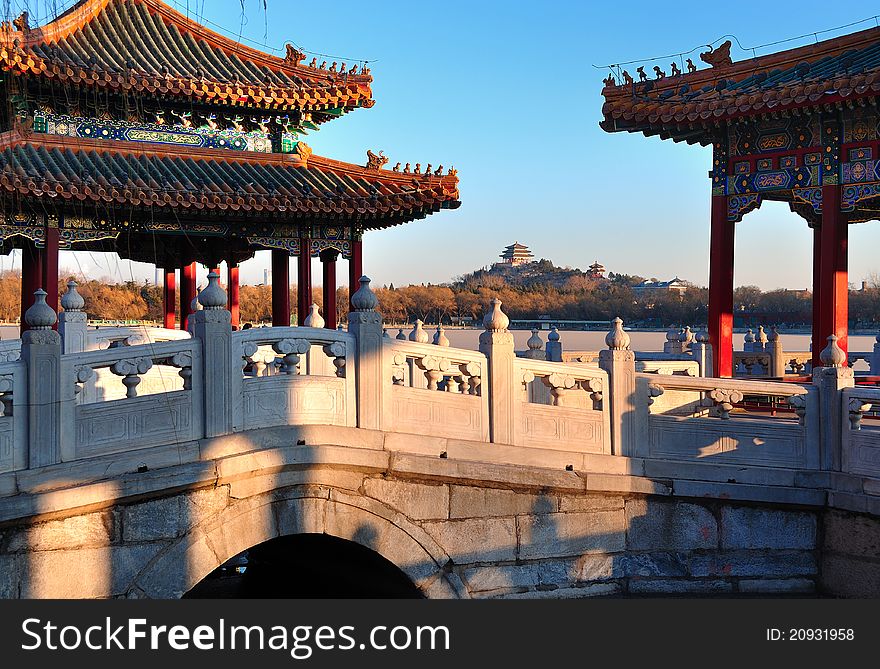 Beihai (North Sea) Park is one of the most popular parks in the city of Beijing. To the southwest of the lake lies the Five-Dragon Pavilions - five connected pavilions with spires and pointed upswept eaves. From a distance, they appear together like a huge dragon. Built first in 1602 and repaired several times in Qing Dynasty, these five pavilions, half over the water, stand on the north bank of the lake opposite the Jade Flowery Islet. Beihai (North Sea) Park is one of the most popular parks in the city of Beijing. To the southwest of the lake lies the Five-Dragon Pavilions - five connected pavilions with spires and pointed upswept eaves. From a distance, they appear together like a huge dragon. Built first in 1602 and repaired several times in Qing Dynasty, these five pavilions, half over the water, stand on the north bank of the lake opposite the Jade Flowery Islet.