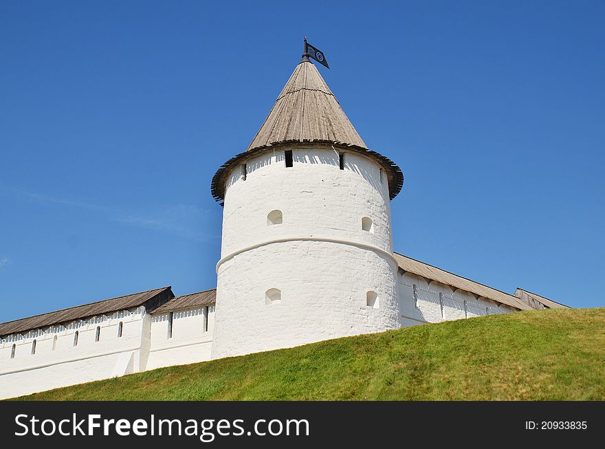 Tower of Kazan Kremlin with unesco flag on a top