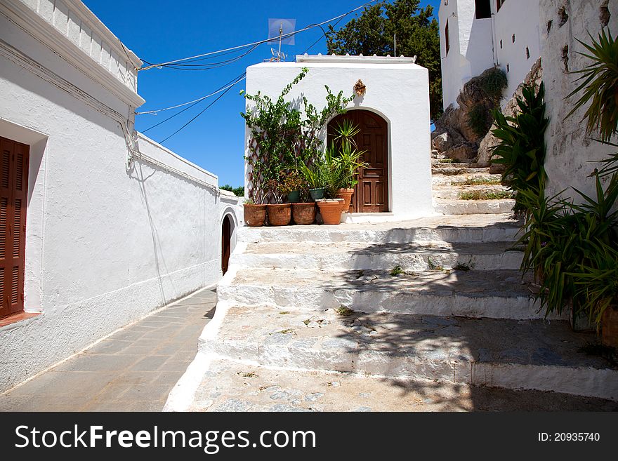 Narrow street in Lindos.Rhodes island, Greece