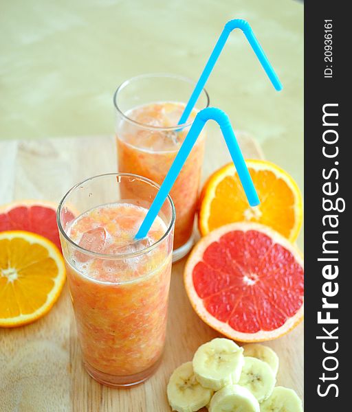 Orange, grapefruit and bananas smoothie for hot summer days. Orange, grapefruit and bananas smoothie for hot summer days