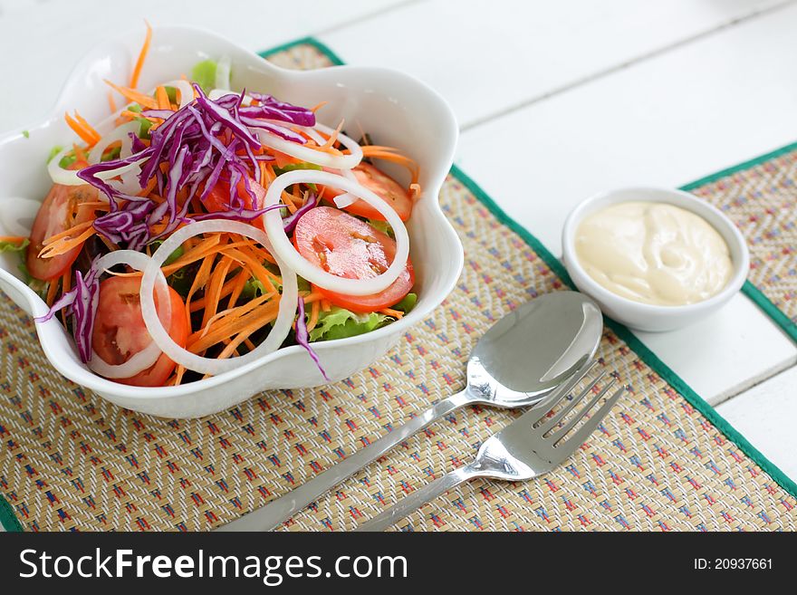 Fresh vegetable salad on the mat outdoor light