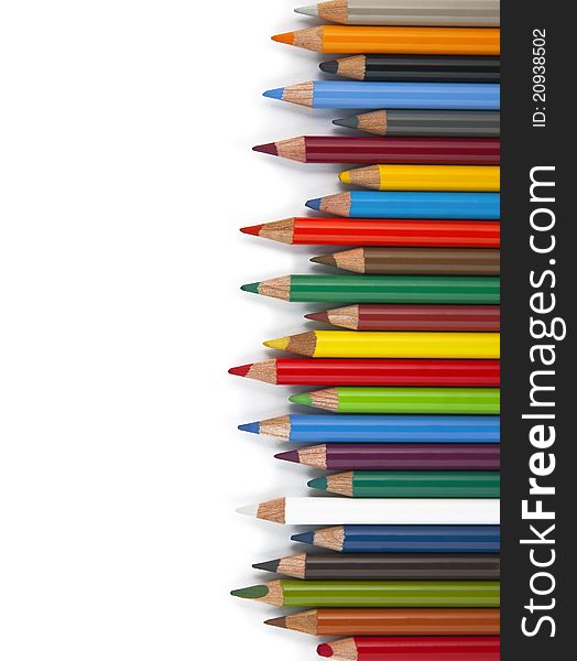 Brightly colored pencils on white background