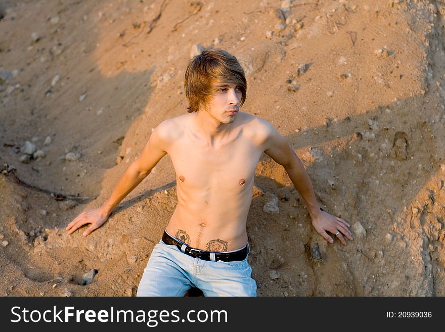 man walking near sand. man walking near sand