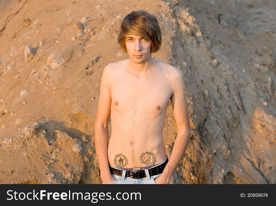 Sexy Man Walking Near Sand