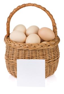 Eggs And Basket On White Stock Photo Eggs And Basket On White Stock Photo