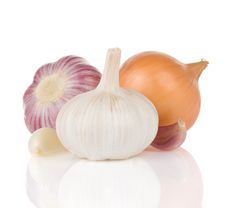 Garlics And Onion On White Stock Photos Garlics And Onion On White Stock Photos