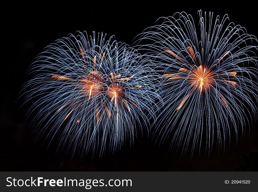 Blue fireworks on dark background. Blue fireworks on dark background