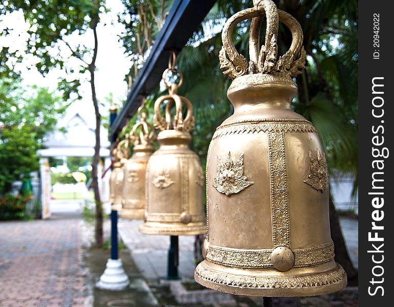 A close up row of bell in Buddhist temple. A close up row of bell in Buddhist temple.