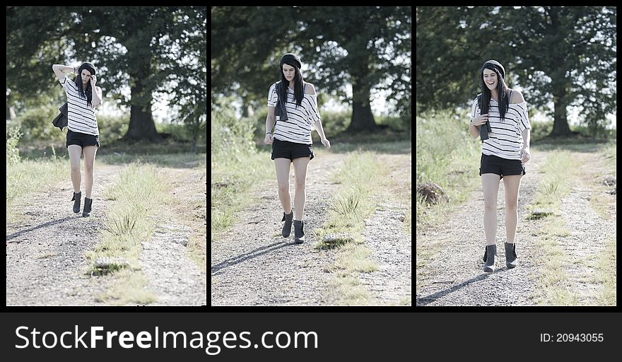 A beautiful young female woman walks down a gravel pathway. A beautiful young female woman walks down a gravel pathway