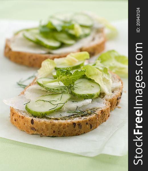 Wholegrain healthy sandwich with cucumber and cabbage. Selective focus
