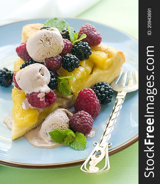 Summer fruit cake with fresh berries and ice-cream. Selective focus