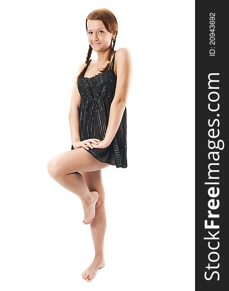 Young smart brunette in little black dress. Isolated over white