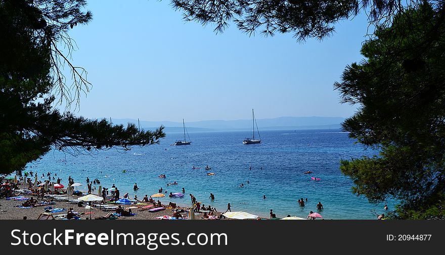 Spectacular Bol, Island of Brac in Croatia, crowded with people and boats near the shore. Spectacular Bol, Island of Brac in Croatia, crowded with people and boats near the shore