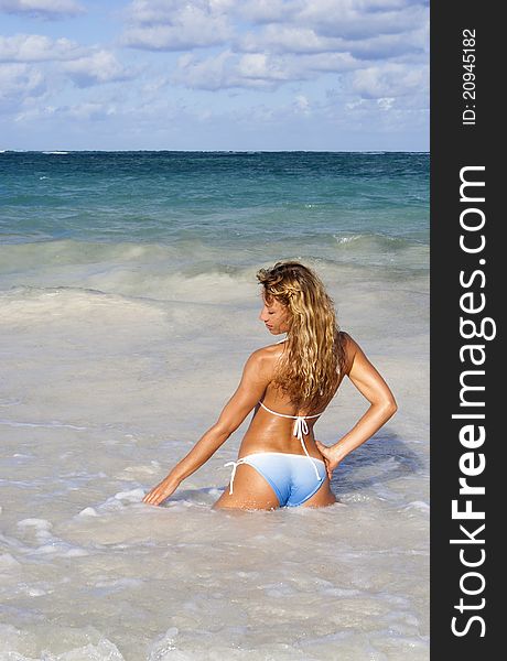 Beautiful woman posing in the caribbean sea