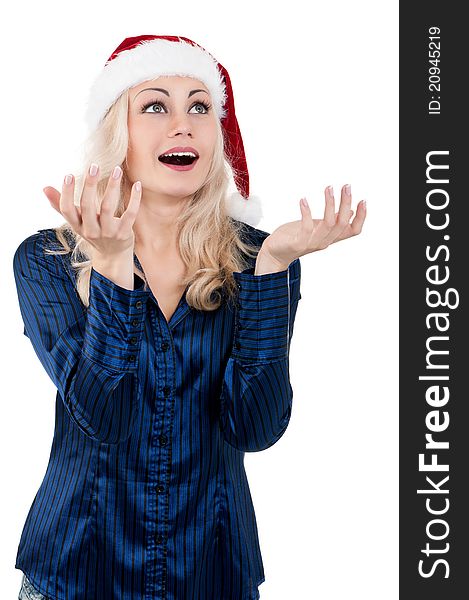 Portrait of a emotional beautiful christmas girl wearing Santa hat. Isolated on white background.