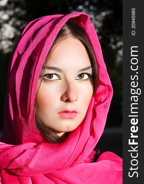 Face of woman in the red scarf with beautiful eyes. Face of woman in the red scarf with beautiful eyes.