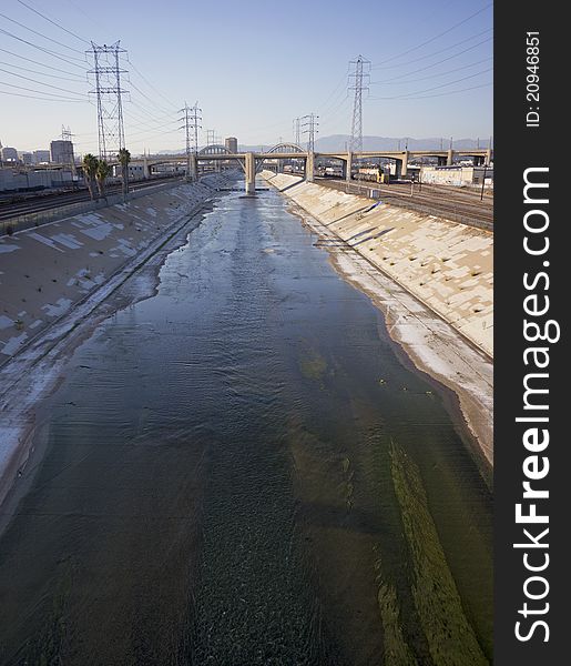 Wide angle view of the Los Angeles River flowing through downtown LA
