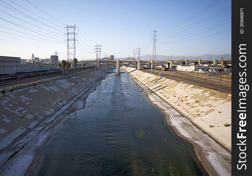 Wide angle view of the Los Angeles River flowing through downtown LA. Wide angle view of the Los Angeles River flowing through downtown LA