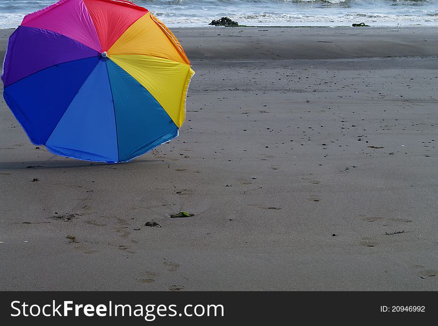 Multi-coloured Beach Umbrella at Sand Beach