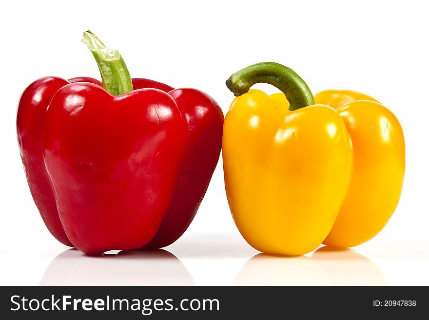 Yellow and red bell pepper on white background. Yellow and red bell pepper on white background
