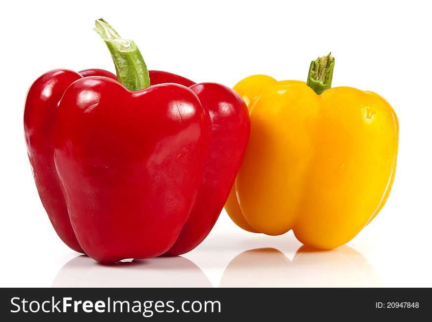 Yellow and red bell pepper on white background. Yellow and red bell pepper on white background