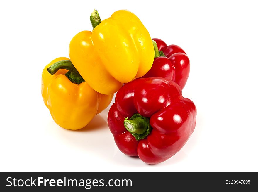 Yellow and red bell pepper on white background. Yellow and red bell pepper on white background