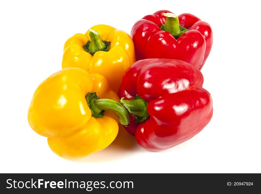 Yellow and red bell pepper on white background. Yellow and red bell pepper on white background