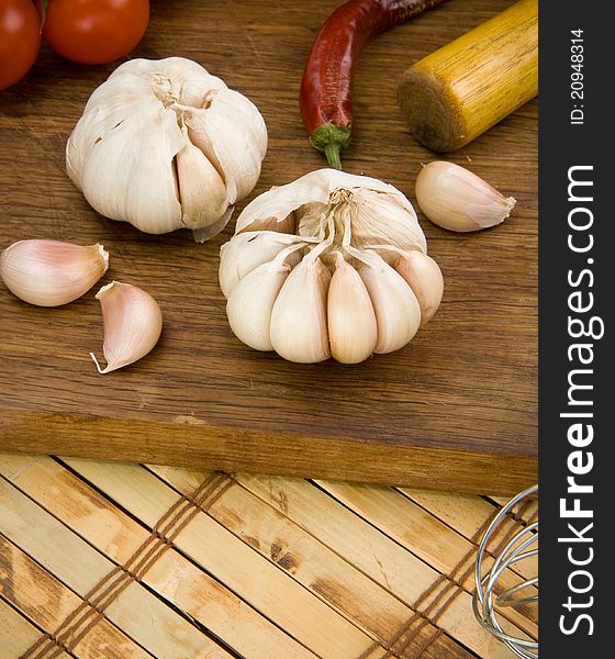 Set of garlic and spice food on wooden texture