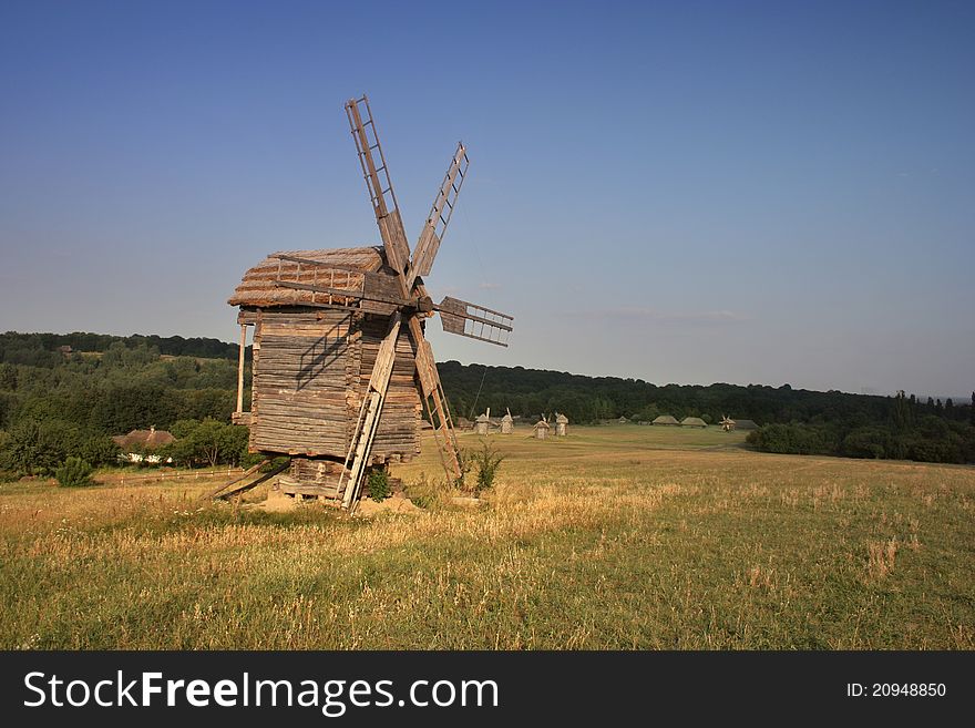 Old wooden mill on the hill. Old wooden mill on the hill