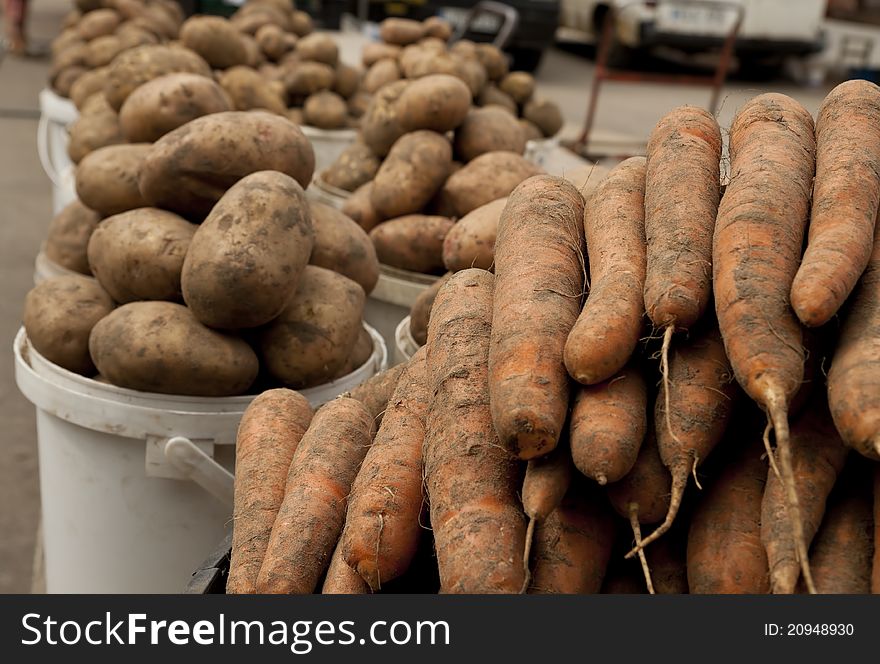 Potato and carrot on local market