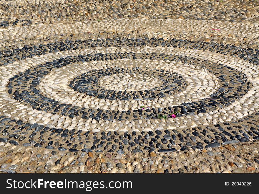 Stone building design concentric circles in a park