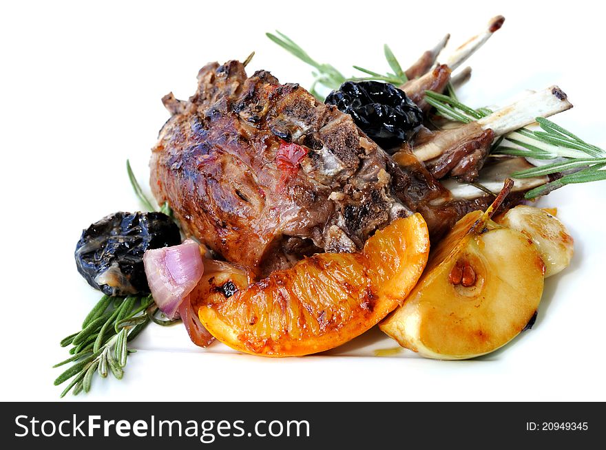 Sweet spicy rack of lamb cooked with fruits.