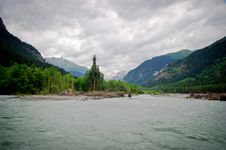 The River In A Valley Between Mountains Royalty Free Stock Images The River In A Valley Between Mountains Royalty Free Stock Images
