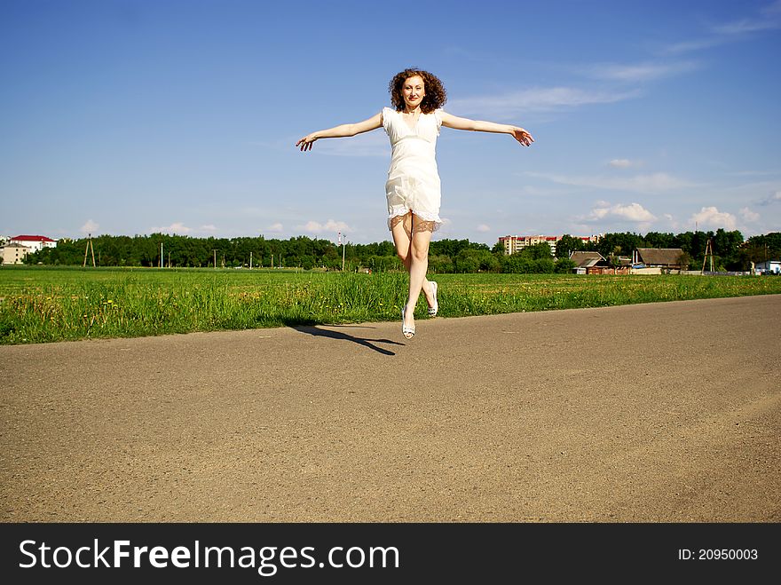 Beauty curly girl flying, levitate. Beauty curly girl flying, levitate