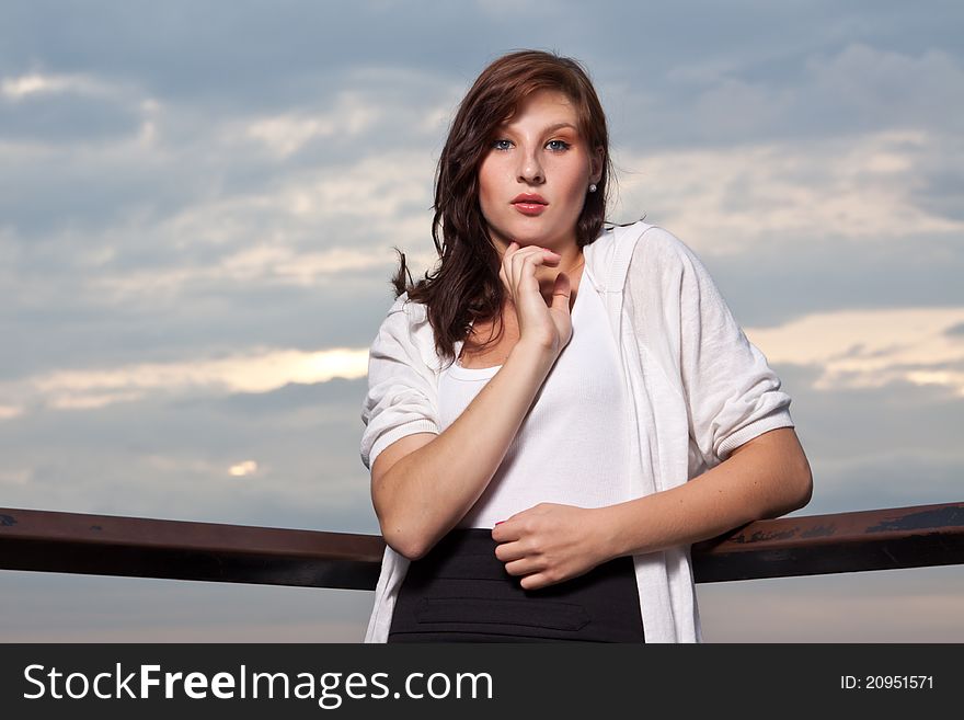 Model posing on sunset background. Model posing on sunset background