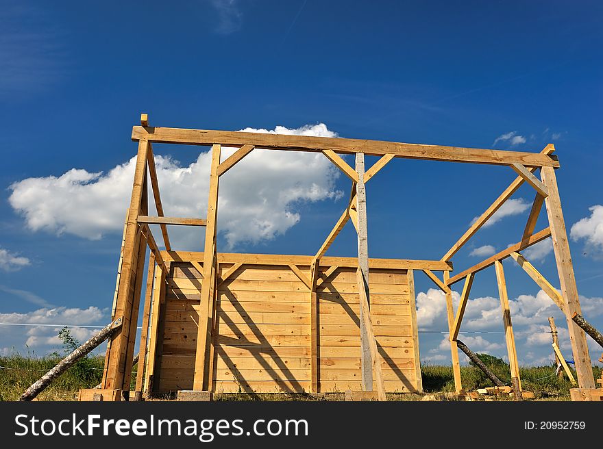 Construction of a small wooden hut. Construction of a small wooden hut