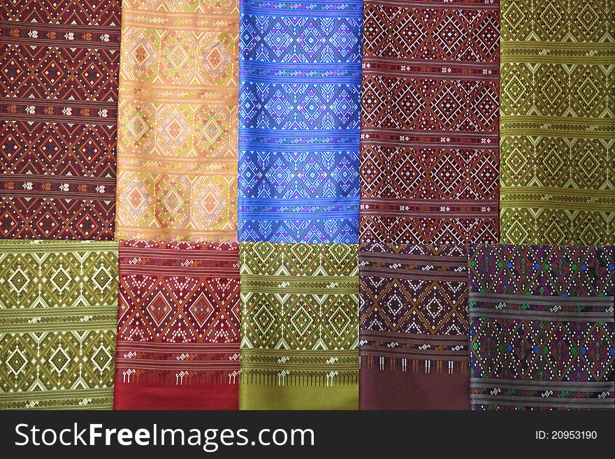 Pieces of colorful praewa silk fabric cloth using as background. Pieces of colorful praewa silk fabric cloth using as background