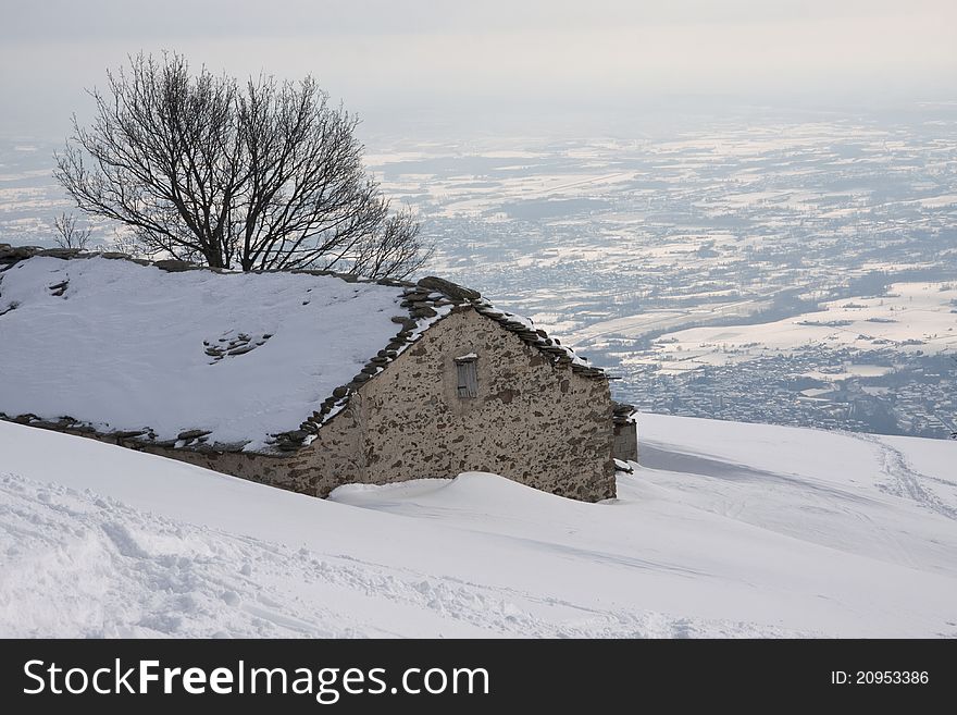 Mountain Cabin In The Snow