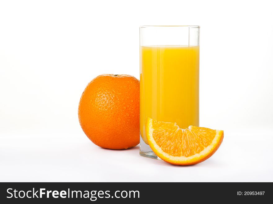 Orange juice and fruit isolated on white