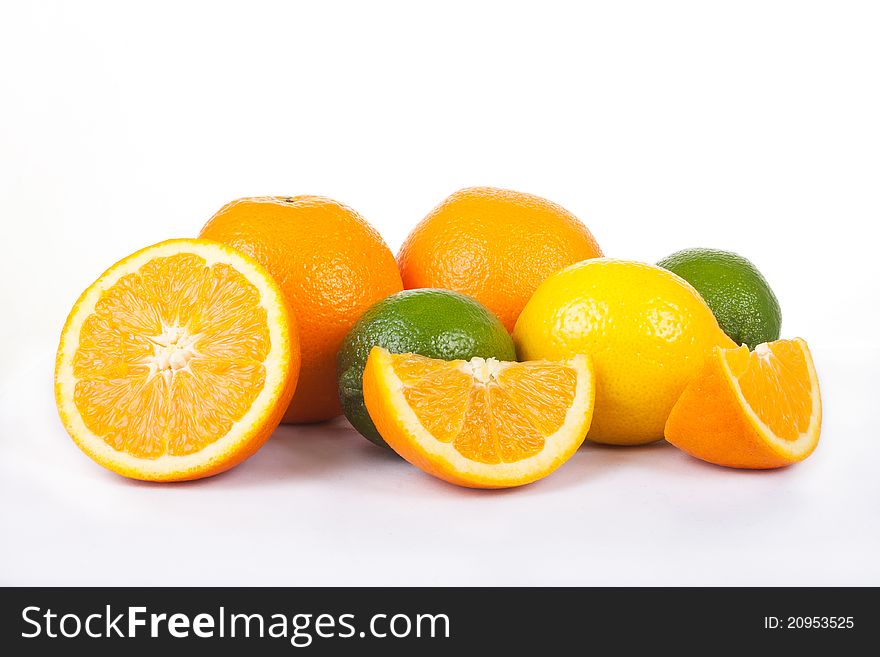 Citrus fruits over white background
