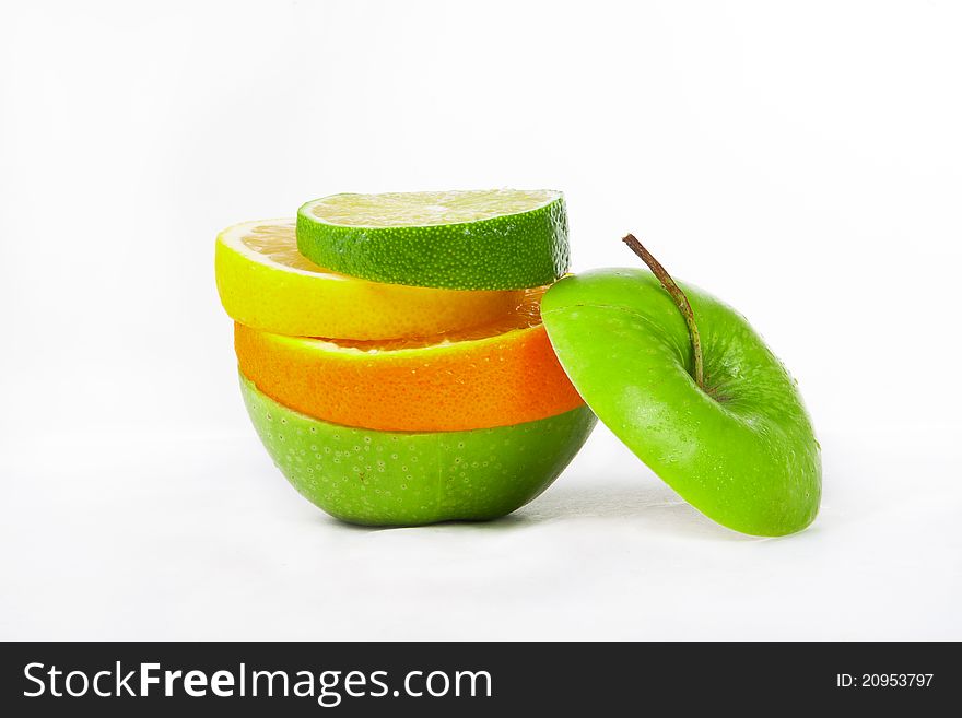 Apple and citrus fruits over white background, mix.